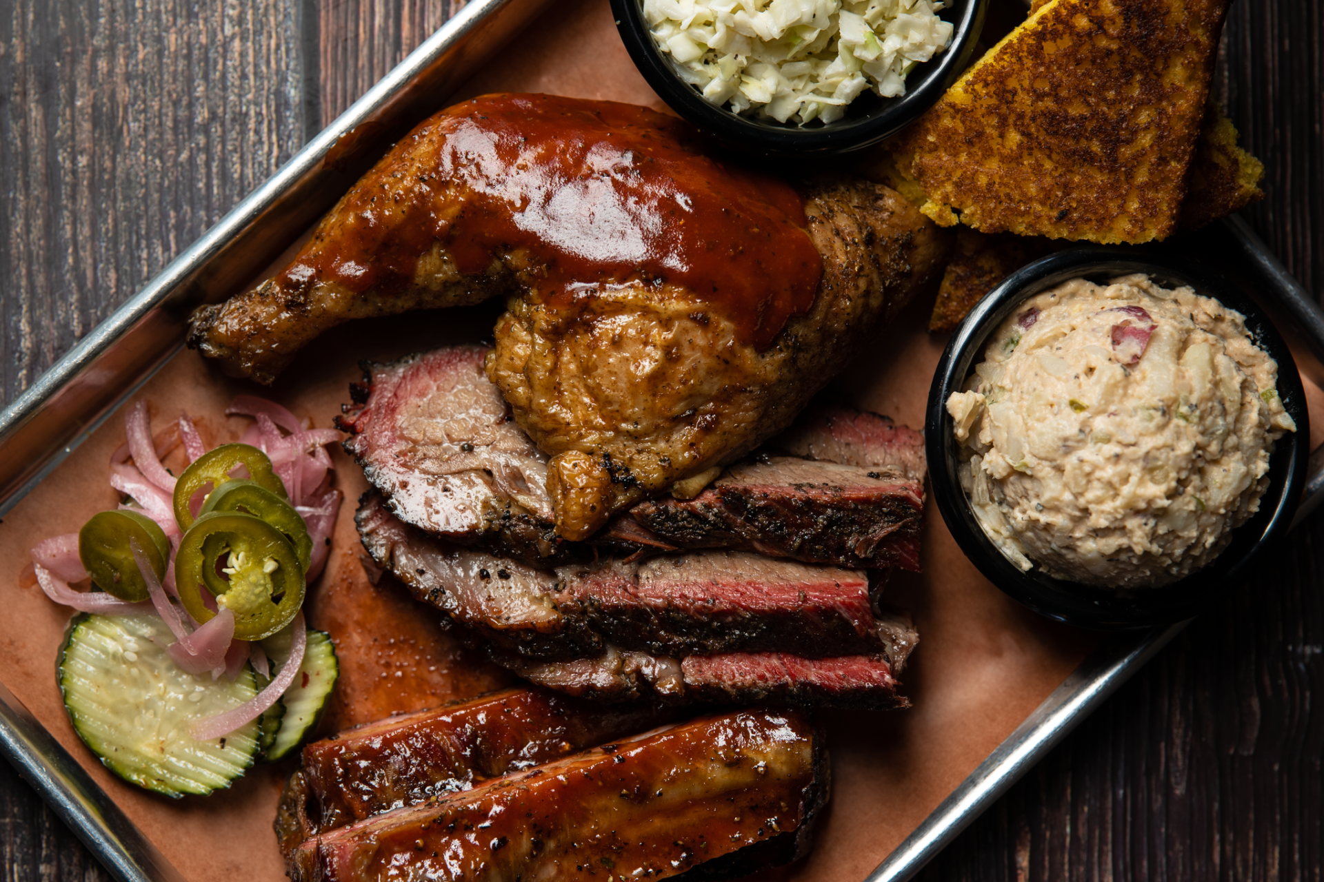 BBQ spread of ribs, chicken, tri-tip and smoked meats