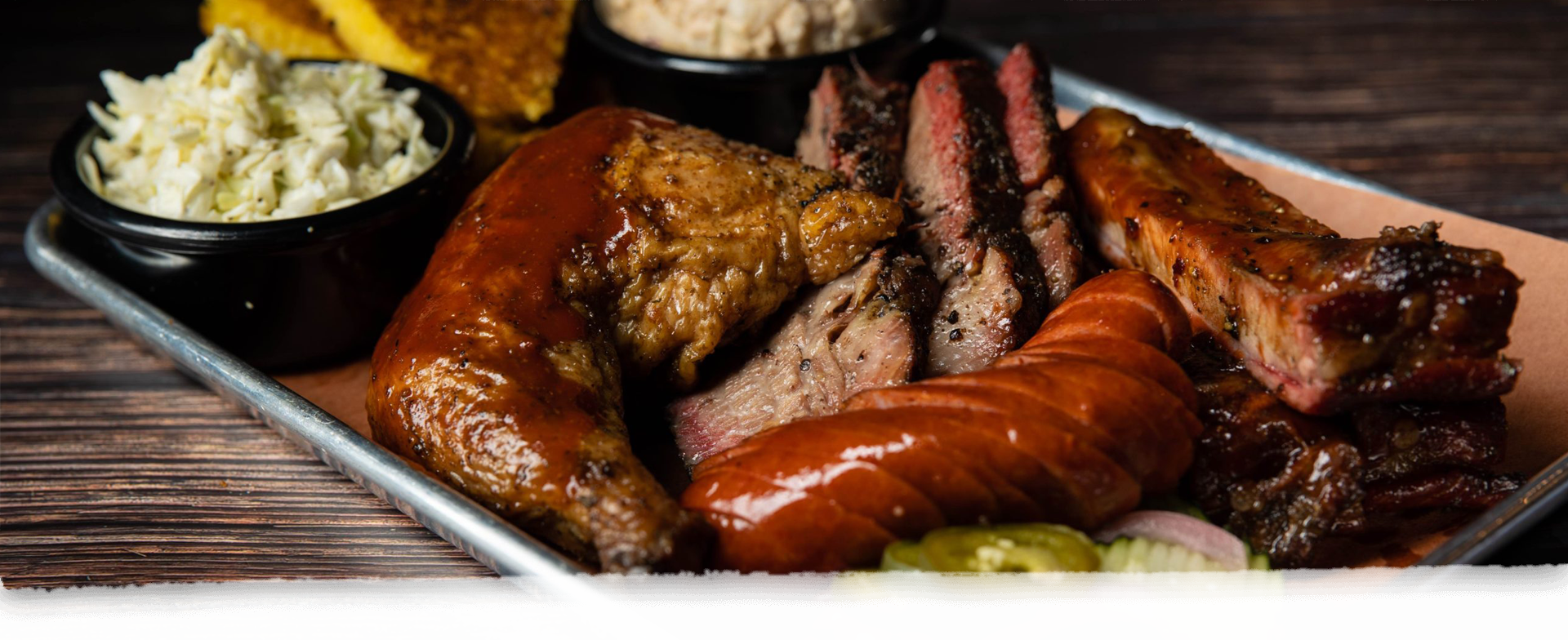 BBQ spread of ribs, chicken, tri-tip and smoked meats