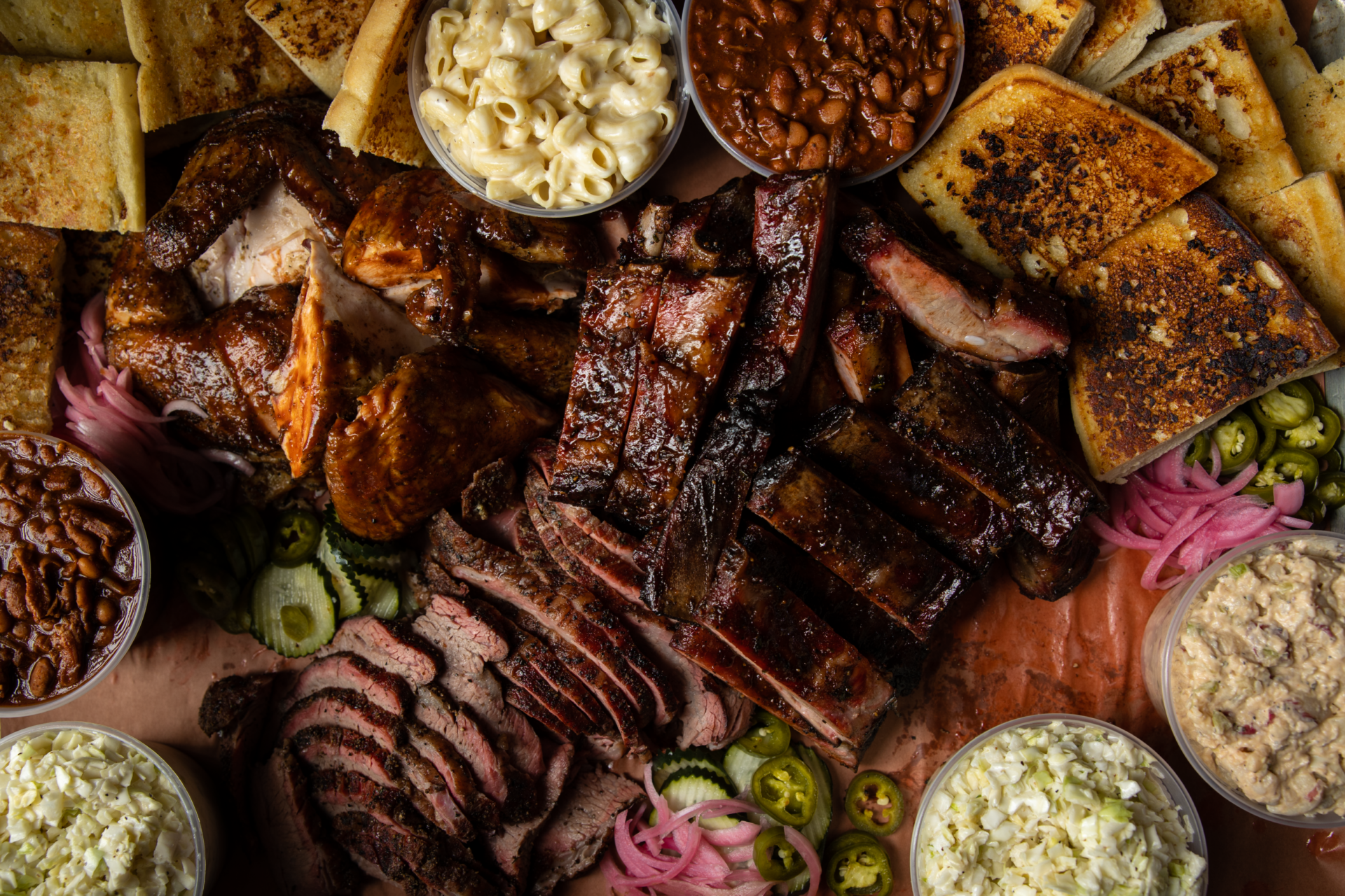 BBQ spread of ribs, chicken, tri-tip and smoked meats